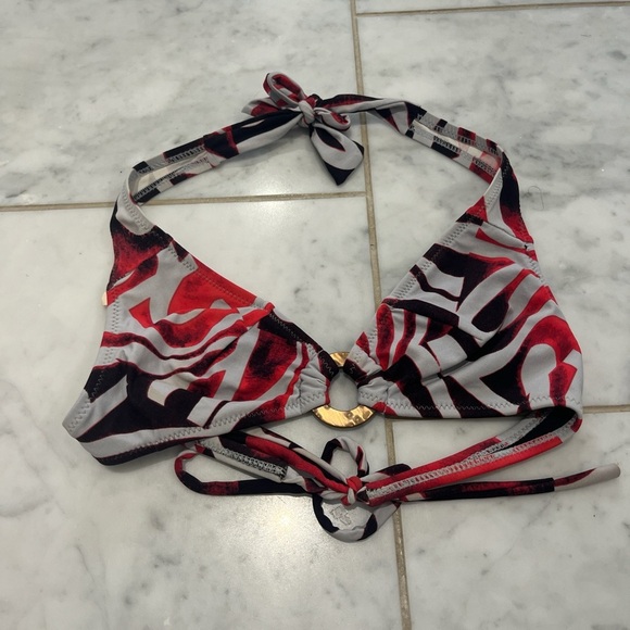 Ulu Red and Black Patterned Bikini. Has a stain on the top. - Picture 2 of 5